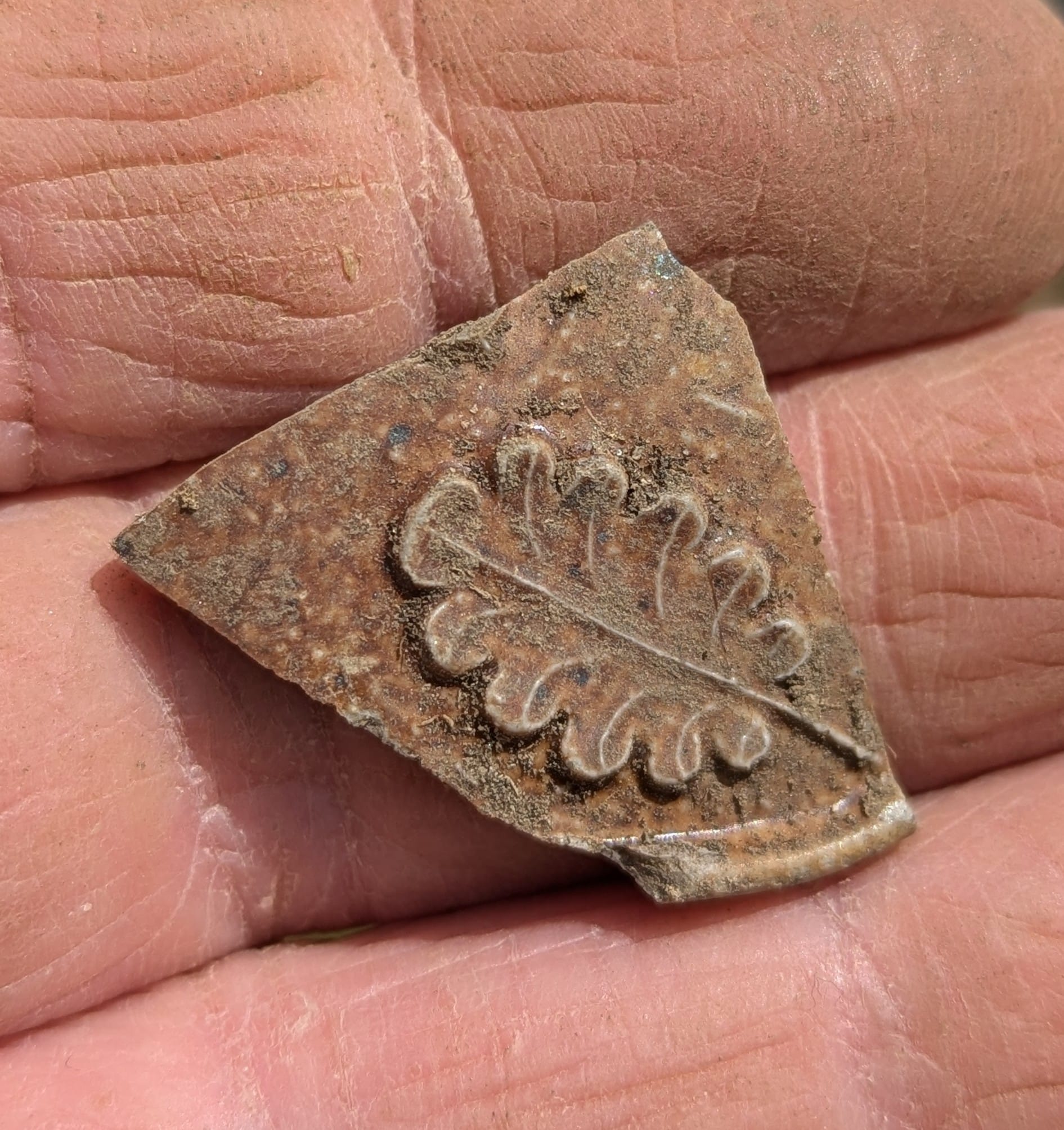 Piece of pottery with leaf detail