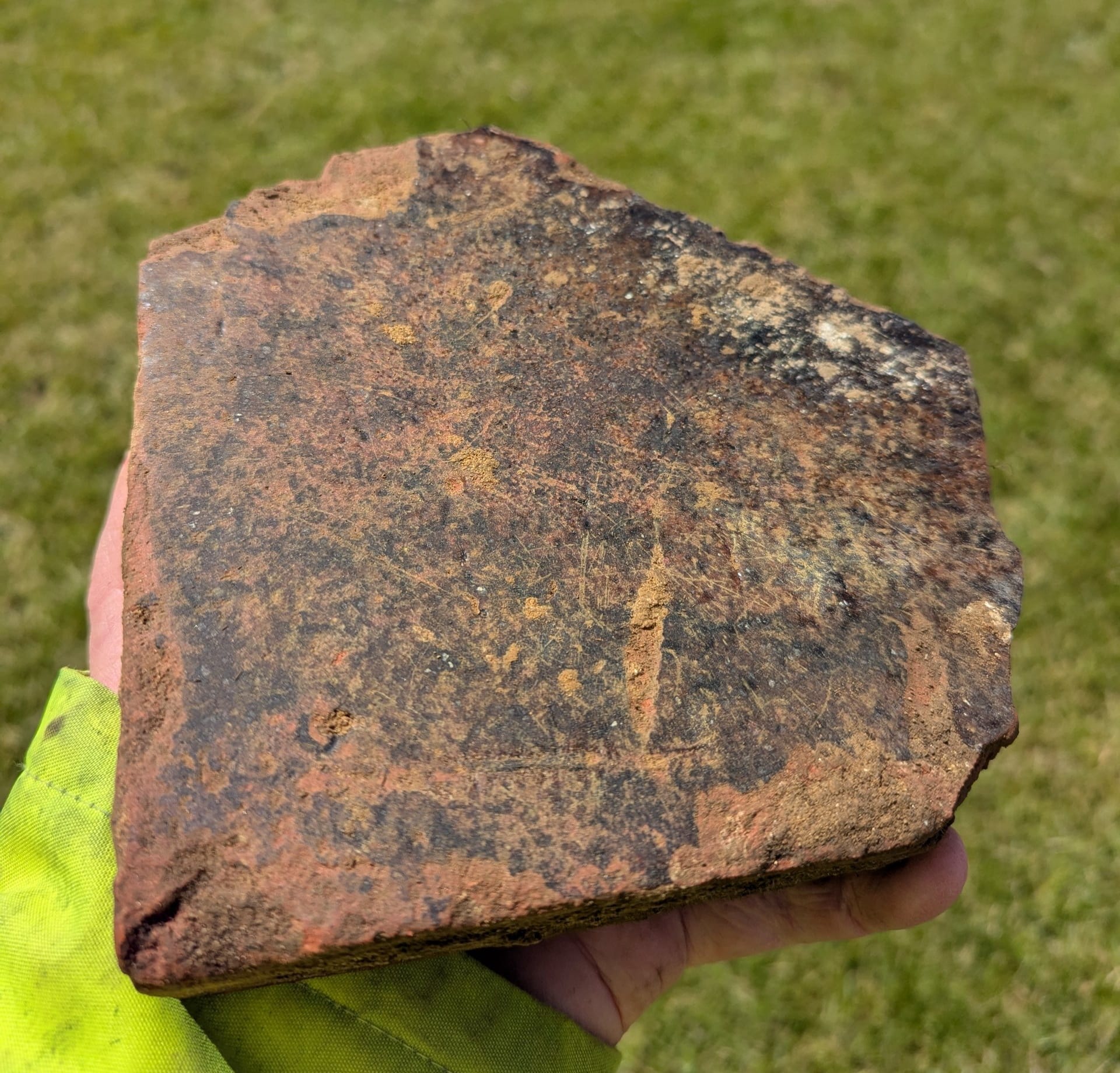 Piece of glazed floor tile